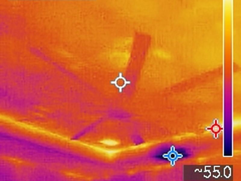The same ceiling in infrared: the supply register shows as a blue cold spot at about 55 degrees against a ceiling near 78.
